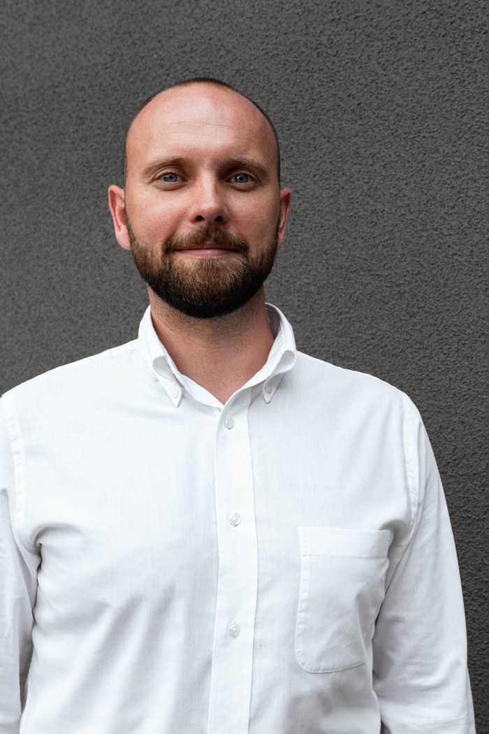 Dmytro Taran, foreign-qualified property and commercial lawyer.